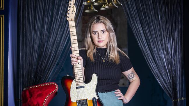 Brisbane Indie pop musician Tia Gostelow, whose song Strangers has had four million streams on Spotify. Photography at The Boom Boom Room, Brisbane. Photo: AAP Renae Droop.