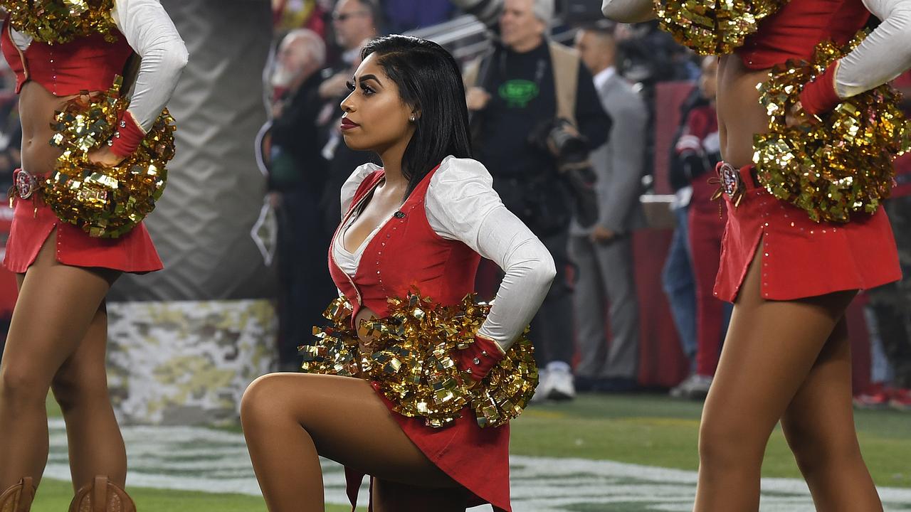 San Francisco 49ers Cheerleader Kneels During National Anthem