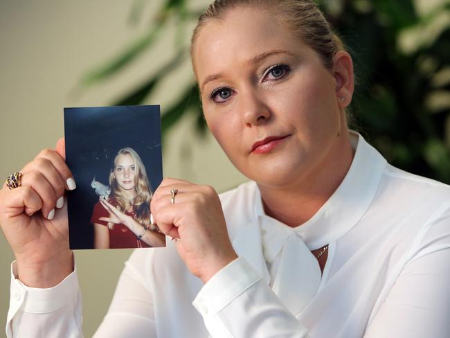 Virginia Roberts holds a photo of herself at age 16, when she says Jeffrey Epstein began abusing her sexually. Picture: Emily Michot/Miami Herald/TNS via Getty