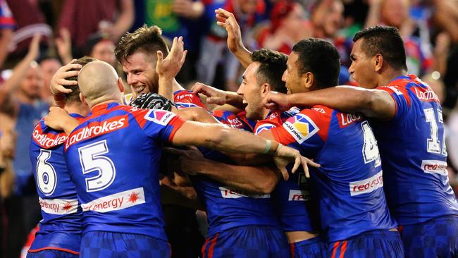 Knights players celebrate during their win over Manly.