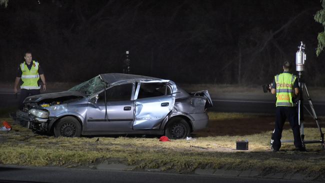 A baseball cap was among the items strewn across the median strip. Picture: Josh Fagan