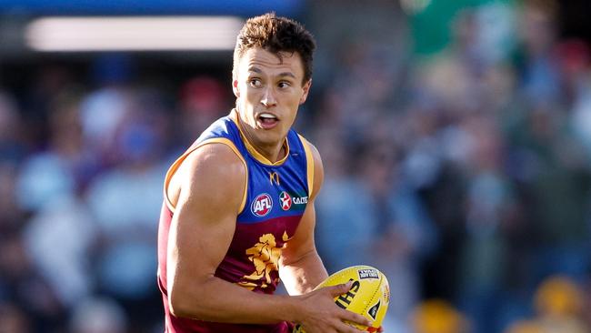 ADELAIDE, AUSTRALIA - APRIL 05: Hugh McCluggage of the Lions in action during the 2024 AFL Round 04 match between the Brisbane Lions and the North Melbourne Kangaroos at Norwood Oval on April 05, 2024 in Adelaide, Australia. (Photo by Dylan Burns/AFL Photos via Getty Images)