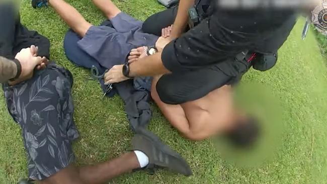 Queensland police officers arrest two alleged offenders during a weekend crack down on Cairns property crime. Picture: Queensland Police Service