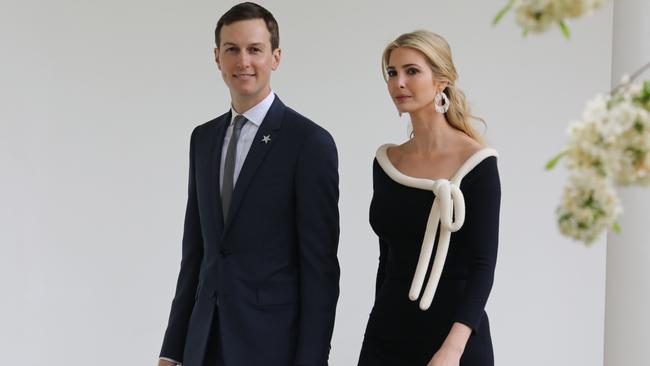 (FILES) In this file photo taken on April 24, 2018 US President special advisor Jared Kushner (L) and his wife Ivanka Trump arrive for the a state welcome ceremony honoring French President Emmanuel Macron at the White House in Washington, DC. US President Donald Trump will not travel to Israel for the opening of the new US embassy in Jerusalem, the White House said May 7, 2018, announcing that his daughter and son-in-law will be members of the delegation.  / AFP PHOTO / LUDOVIC MARIN