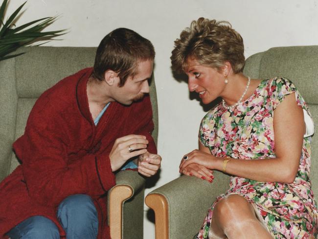 Princess Diana sits in a chair chatting with Steve, 28, at a centre for AIDS / HIV+ patients at Middlesex Hospital in London. Picture: Supplied