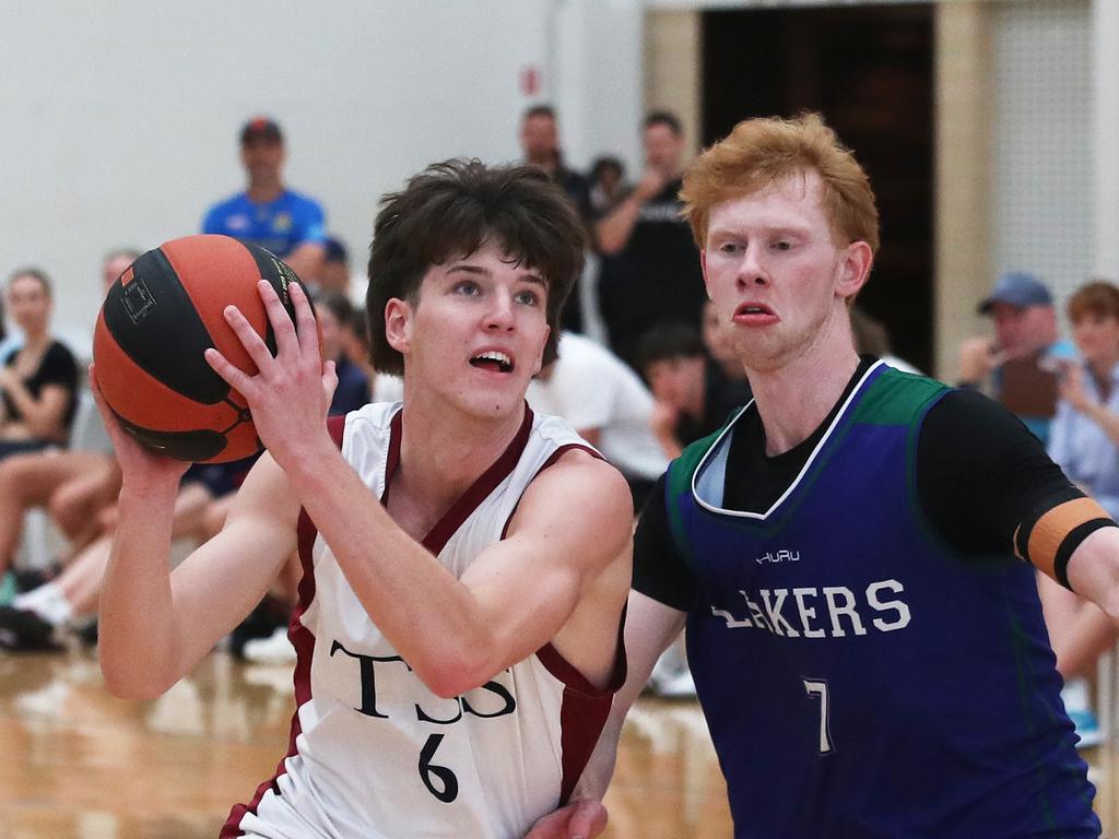 Basketball Australia Schools Championships at Carrara. Mens open final, Lake Ginninderra College Lakers V TSS (in white). the Lakers defence gave Benjamin Tweedy from TSS special attention in the final. Picture Glenn Hampson