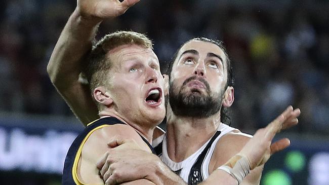 Brodie Grundy jostles for position with Adelaide ruckman Reilly O’Brien. Picture: Sarah Reed.