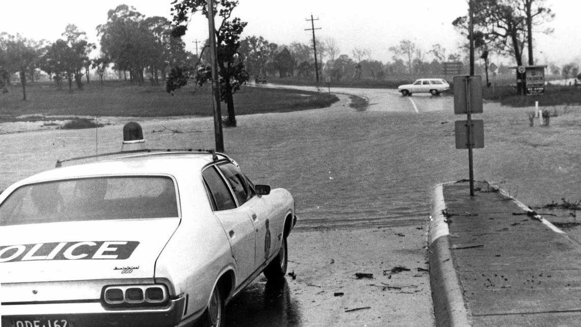 Andrew Gale talks about being a policeman when the floods come. Photo courtesy of the State Library. Picture: Contributed