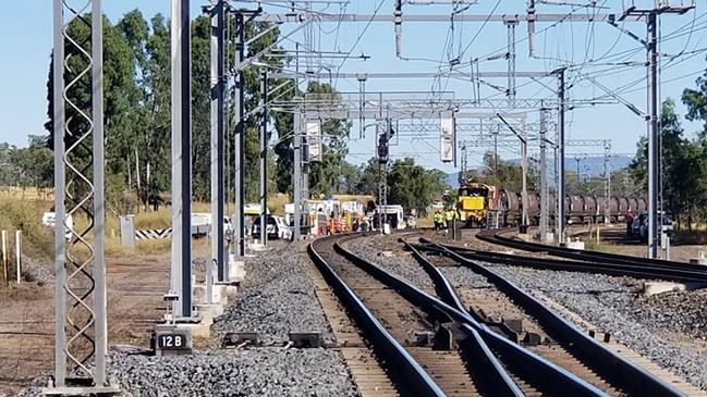 Emergency services at the scene of the train collision at Westwood, west of Rockhampton, on June 18, 2021.