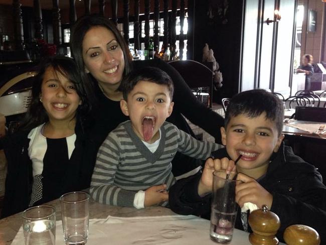 They look sweet now, but you try herding three kids under eight in a busy post office on a Monday afternoon. Julie Salama pictured with her children.