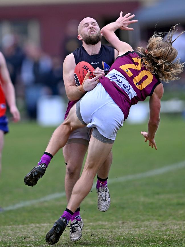 VAFA: Old Haileybury pair Jack Grenda and Ben O’Leary collide. Picture: Andy Brownbill