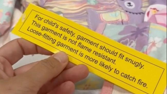 The yellow tag seen on flame-resistant pjs. Image: Supplied / The Sun