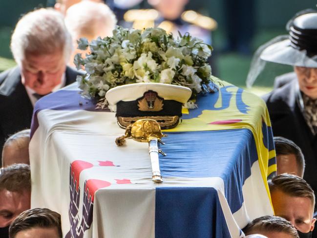 Princess Anne and Prince Charles follow the coffin of Prince Philip, featuring the flowers chosen by the Queen. Picture: Getty Images