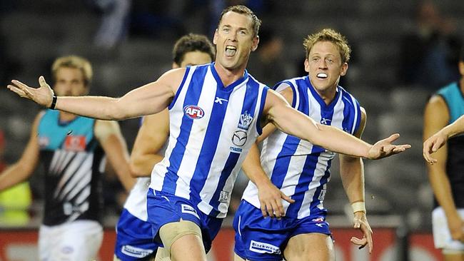 Adam Simpson played 306 games for North Melbourne before coaching the Eagles.