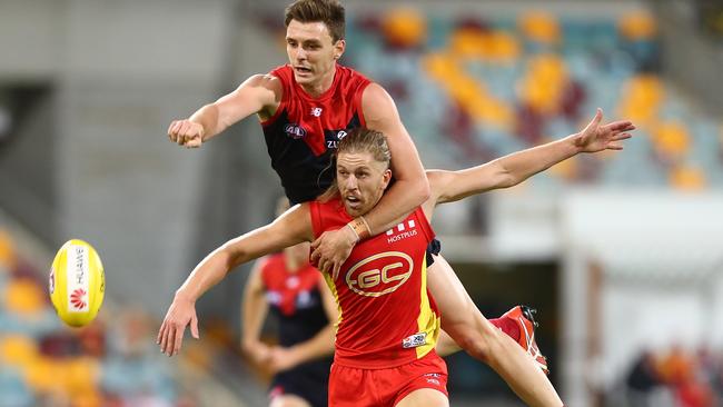 Melbourne’s Jake Lever spoils Gold Coast’s Aaron Young. Picture: Getty Images