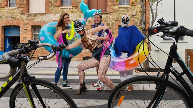 Port Adelaide Mayor Claire Boan, Incognito, Greg the Cyclist and The Director prepare for Tour Down Under celebrations in Lipson Street. Picture: AAP Image/ Brenton Edwards