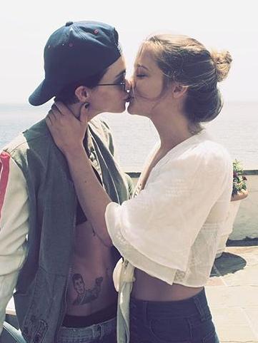 Ruby Rose smooches Harley Gusman.