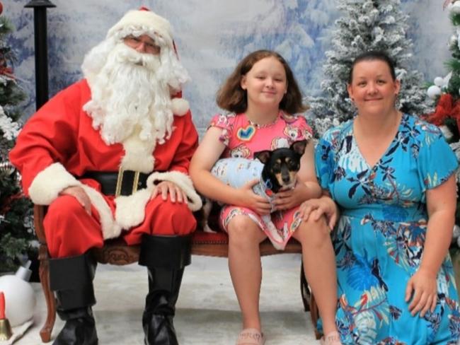 Jade Kylie Middleton, Maddison Hayes and their dog Scruff with Santa: Petbarn 2022 - Fraser Coast. Sent in by Jade Kylie Middleton.