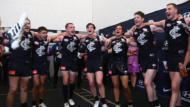 Carlton players sing the song after their win over Gold Coast. Picture: Chris Hyde.