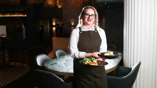 Barista Caitlin Moss with a couple of the modern Australian dishes on offer at The Belvedere. Picture: NIKKI DAVIS-JONES