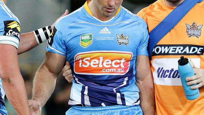 Mark Minichiello is concussed in his 150th game during the NRL round 24 game between the Gold Coast Titans V Warriors at Skilled Park, Robina. Pics Adam Head