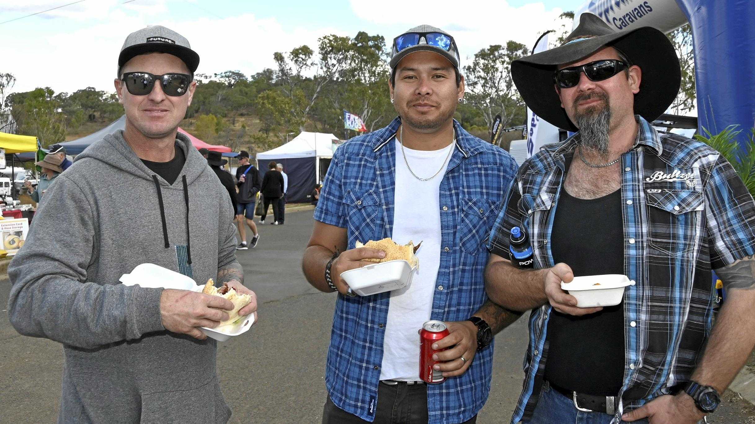 Enjoying a snack break at the Queensland Outdoor Adventure and Motoring Expo at the Toowoomba Showgrounds are (from left) Matt Cox, Werner Liddel and Mark Sherwood. Queensland Outdoor Adventure & Motoring Expo. August 2019. Picture: Bev Lacey