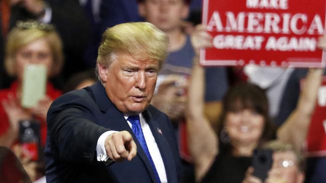 President Donald Trump reacts to supporters as he leaves a rally in Southaven, Mississippi today. Picture: AP