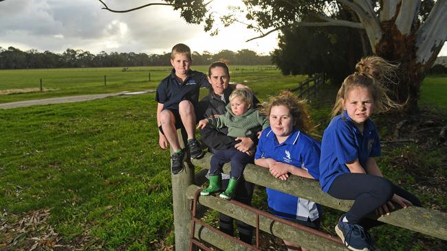 Teegan Galpin, with her kids Oscar, 8, Spencer, 18 months, Mia, 11 and Ruby, 7, has have moved back in with her parents David and Alison – so they can keep going to Penola primary school. Picture: Tom Huntley