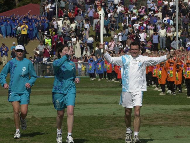 Olympic Torch Relay Day 89, Penrith to Bowral. Ultra-marathon runner and Macarthur state Liberal MP Pat Farmer carrying flame on September 4.