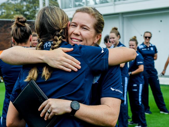 Cricketer Alex Blackwell (centre) is congratulated by team members after announcing her retirement in 2018. Picture: AAP/Brendan Esposito