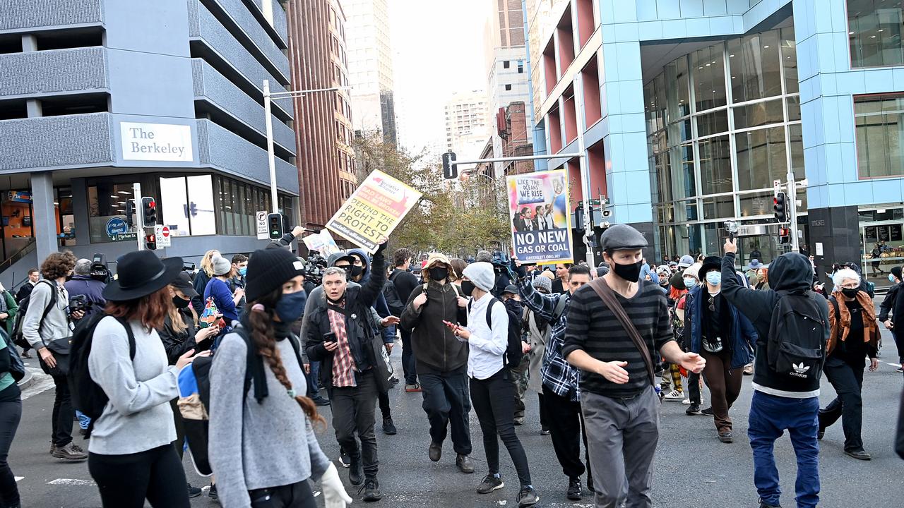 Protesters marching through Sydney's CBD near Market Street disrupting the traffic as part of Blockade Australia protests on Monday. Picture: NCA NewsWire / Jeremy Piper