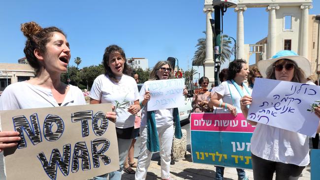 Arab and Jewish Israeli women demonstrate together to call for coexistence and a halt of the ongoing violence between Israel and the Palestinian Hamas movement at the entrance of Jaffa, near the Israeli coastal city of Tel Aviv, on May 14. Picture: Gideon Markowicz/AFP