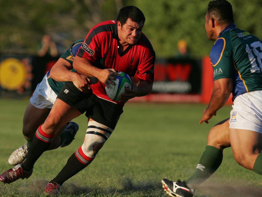 Nambour coach Bruce Heard charges ahead during his playing days. Picture: Brett Wortman