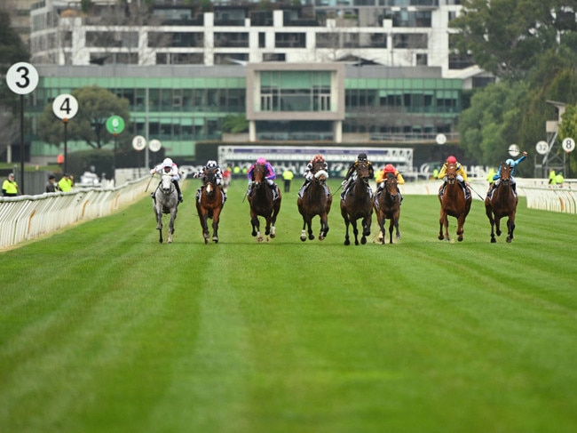 MELBOURNE, AUSTRALIA - AUGUST 03: Jye McNeil riding Right To Party (grey) winning Race 6, the Aurie's Star Handicap - Betting Odds during Melbourne Racing at Flemington Racecourse on August 03, 2024 in Melbourne, Australia. (Photo by Vince Caligiuri/Getty Images)