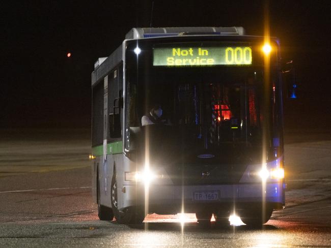 The evacuees are taken by bus at Perth Airport. Picture: Getty Images