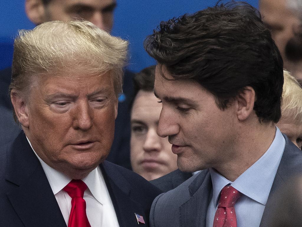 Incoming US President Donald Trump andoutgoing Canadian Prime Minister Justin Trudeau. Mr Trump claims the line between the US and Canada is “artificially drawn.” Picture: Dan Kitwood/Getty Images