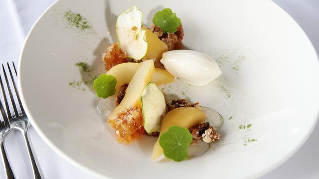 Poached pear with nuts, yoghurt and honeycomb. Pictures: Andrew Tauber