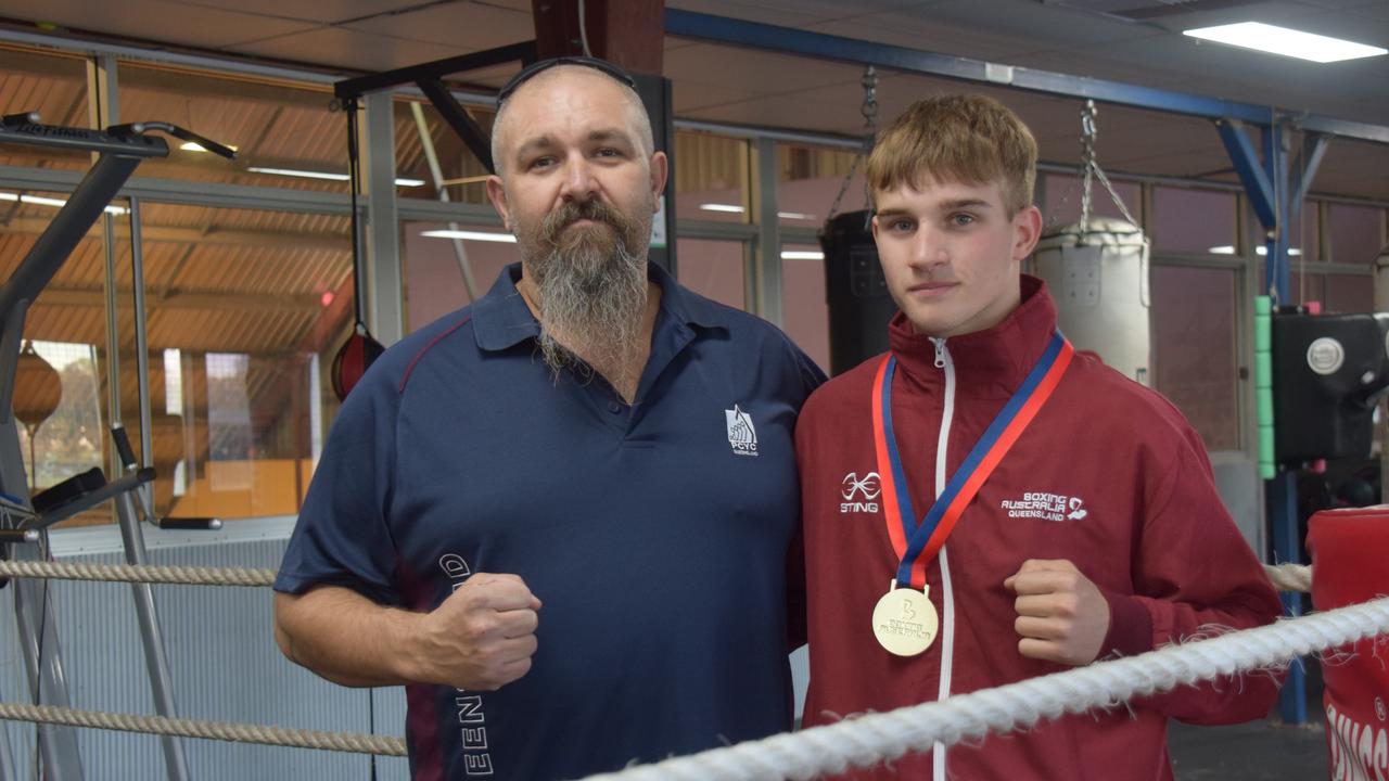 Dalby boxer Judd Alderton with coach and father Andrew. Picture: Emily Devon