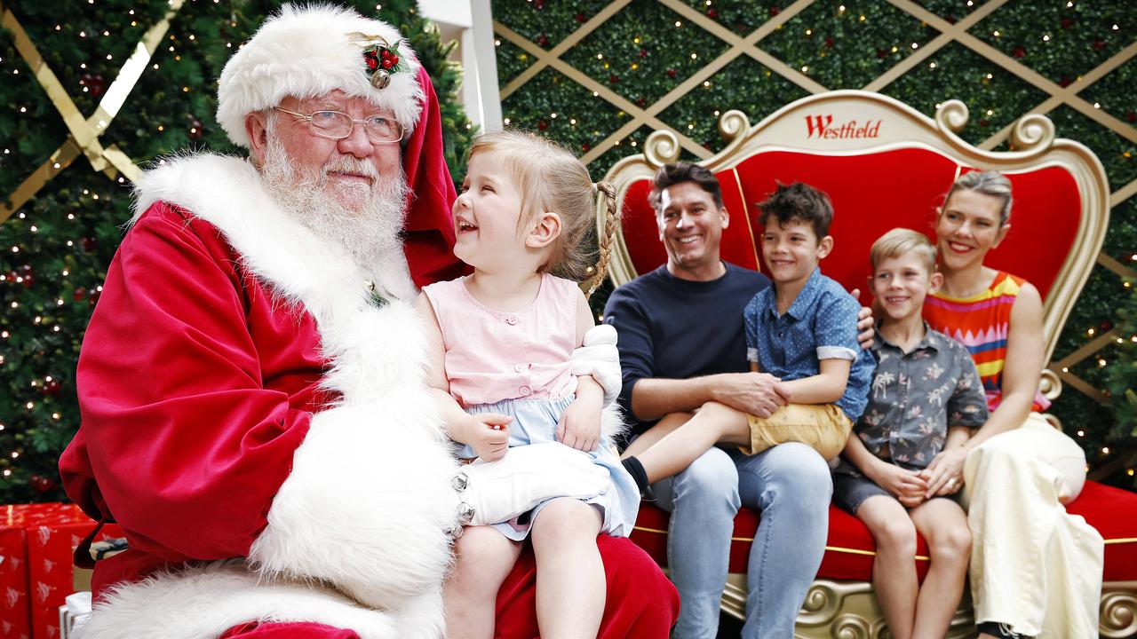 Full Santa photo experience back as kids can sit on Mr Claus lap again |  Daily Telegraph