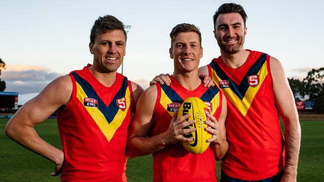 SANFL State team forwards Luke Reynolds, Lachie Hosie and Liam McBean together in Adelaide on Tuesday, May 11, 2021.