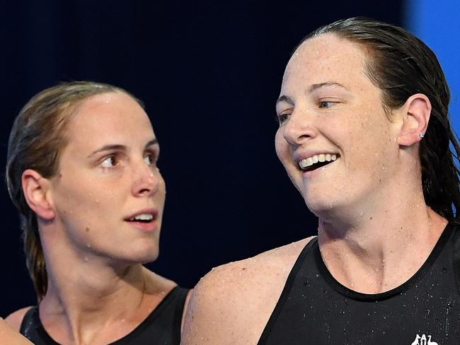 Bronte Campbell (left) and Cate Campbell of Australia are seen following the Women's 50m Freestyle Final on day three of swimming competition at the XXI Commonwealth Games at Gold Coast Aquatic Centre on the Gold Coast, Australia, Saturday, April 7, 2018. (AAP Image/Dave Hunt) NO ARCHIVING, EDITORIAL USE ONLY