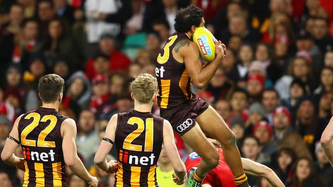 SYDNEY, AUSTRALIA - JULY 14: Cyril Rioli of the Hawks marks during the round 17 AFL match between the Sydney Swans and the Hawthorn Hawks at Sydney Cricket Ground on July 14, 2016 in Sydney, Australia. (Photo by Cameron Spencer/Getty Images)