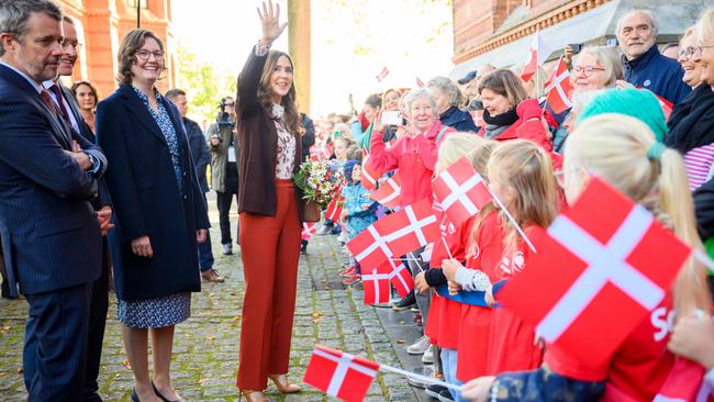 Queen Mary appeared relaxed as she waved to young and old in the crowd. Picture: Getty Images