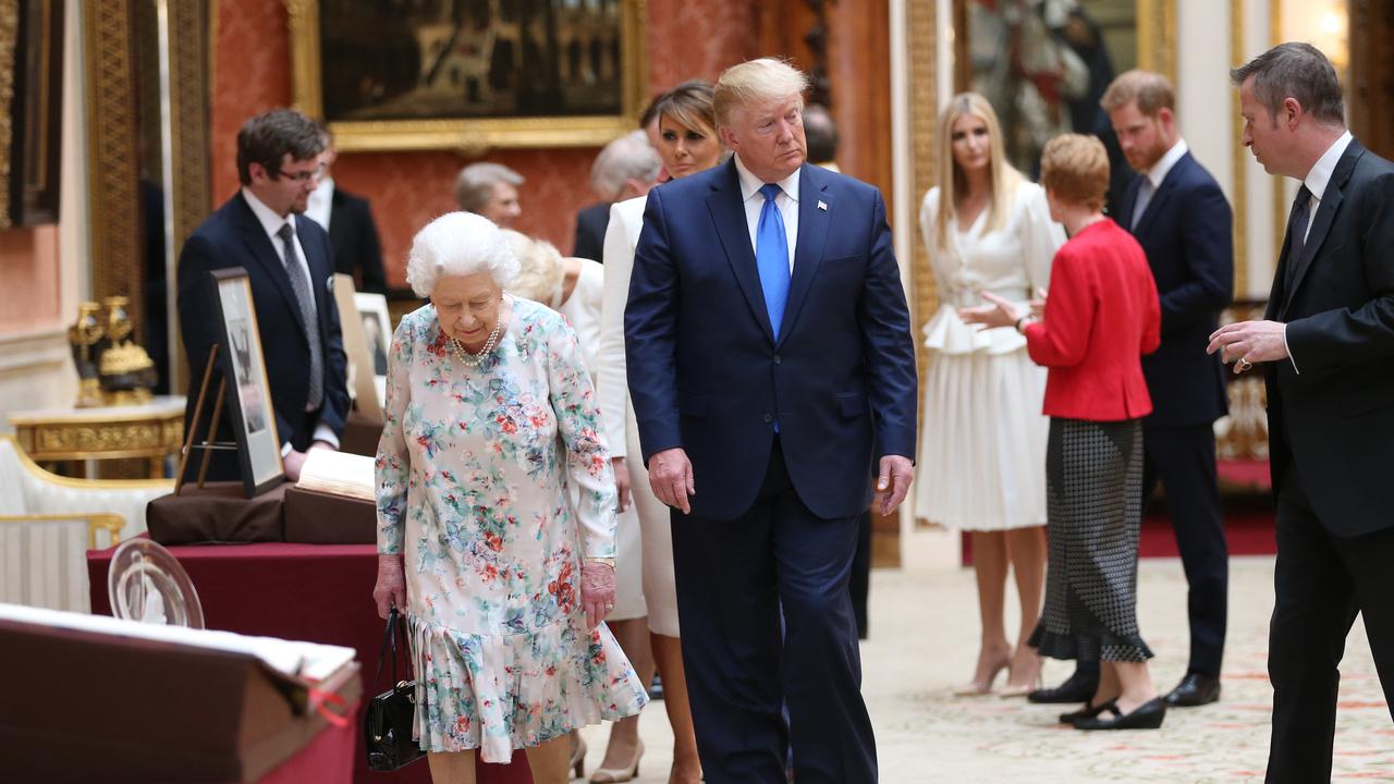 Prince Harry seemingly steering clear of Donald Trump during his visit to Buckingham Palace. Picture: Ian Vogler/WPA Pool/Getty Images.