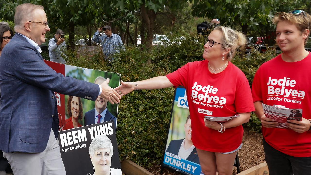 Prime Minister Anthony Albanese greets Labor Party volunteers at Derinya Primary School in Frankston South, on polling day for the Federal seat of Dunkley. Picture: Ian Currie