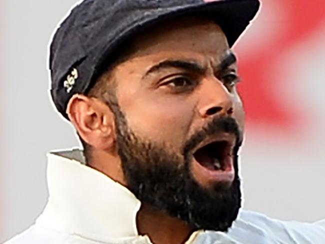 Indian captain Virat Kohli celebrates the dismissal of Australian batsman David Warner during the fourth day of the third Test cricket match between India and Australia at The Jharkhand State Cricket Association (JSCA) Stadium Complex in Ranchi on March 19, 2017. ----IMAGE RESTRICTED TO EDITORIAL USE - STRICTLY NO COMMERCIAL USE----- / GETTYOUT---- / AFP PHOTO / SAJJAD HUSSAIN / ----IMAGE RESTRICTED TO EDITORIAL USE - STRICTLY NO COMMERCIAL USE----- / GETTYOUT