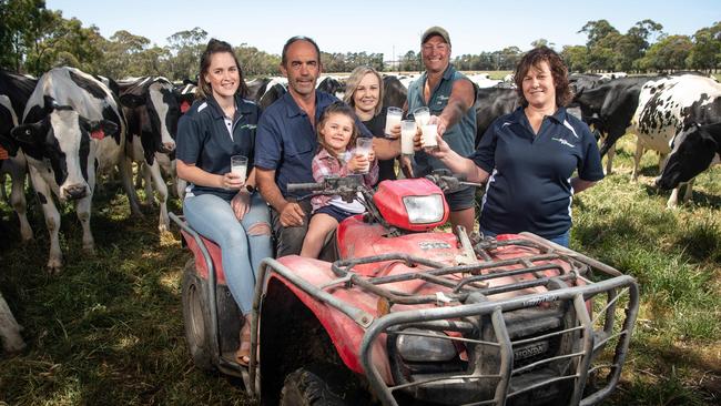 Fleurieu Milk Company dairy farmers Kasey Clarke, Geoff Hutchinson, Braylee Amm, Toni Hutchinson, Barry Clarke and Louise Hutchinson in the paddock. Picture: Brad Fleet