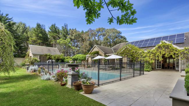 The sheltered pool sits alongside a spa and sauna.