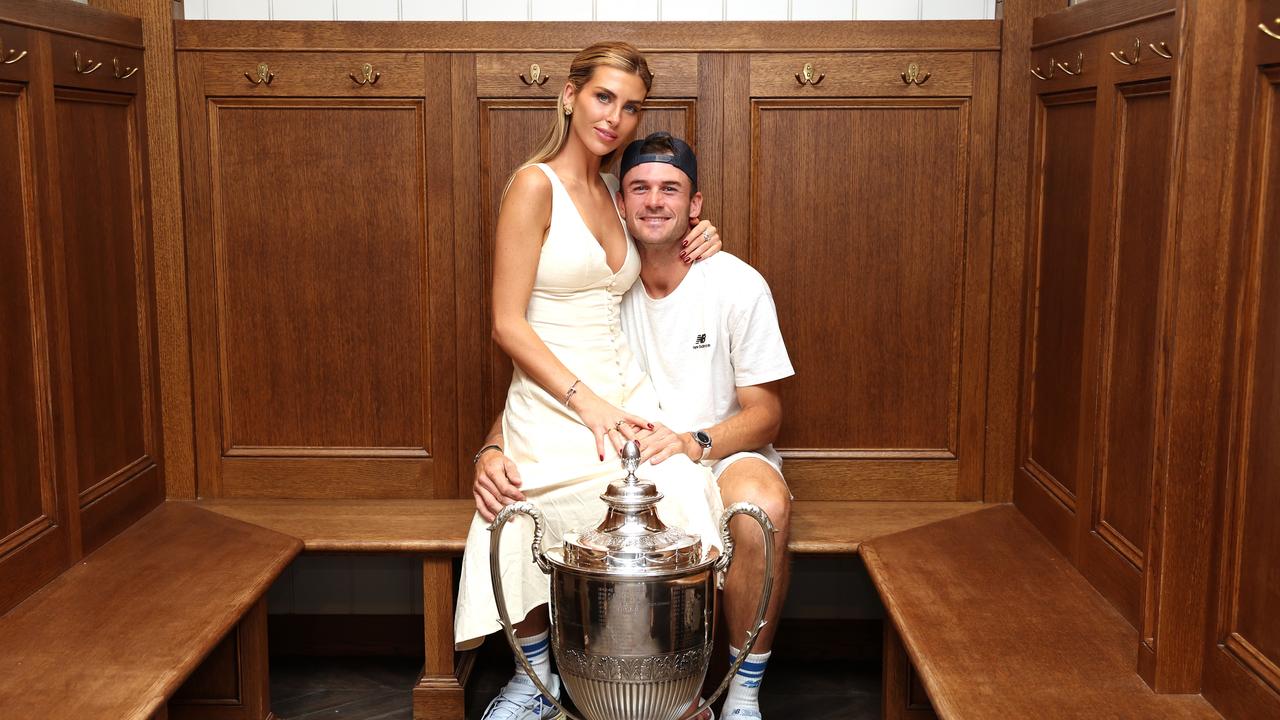 The happy couple in the locker room. (Photo by Clive Brunskill/Getty Images)