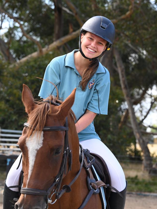 Geelong Grammar School Year 12 student Odette Bell with her horse Poppy.